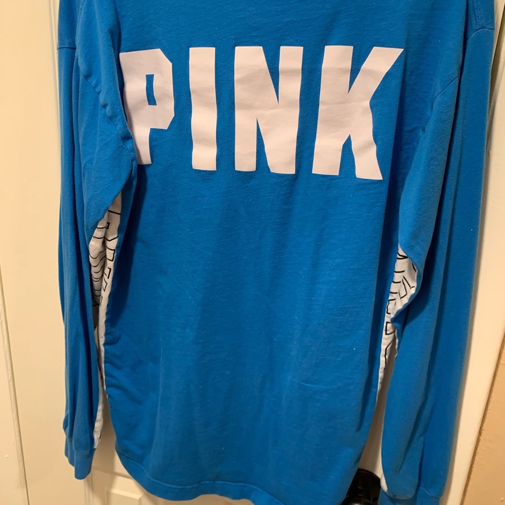 Pink brand shirt